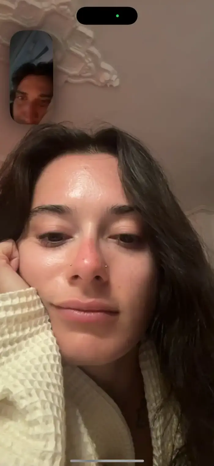 a facetime screenshot of olivia, his own face small in the corner
